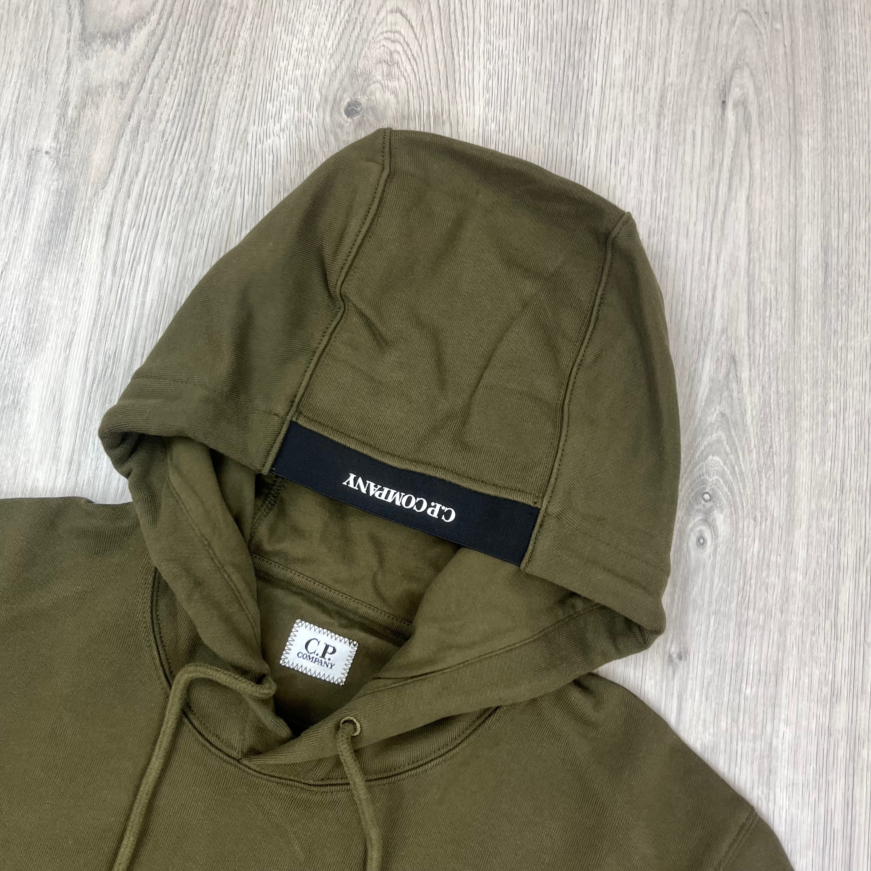 Men's CP Company Raised Fleece Hoodie in Ivy Green. On sale at Open Attire.