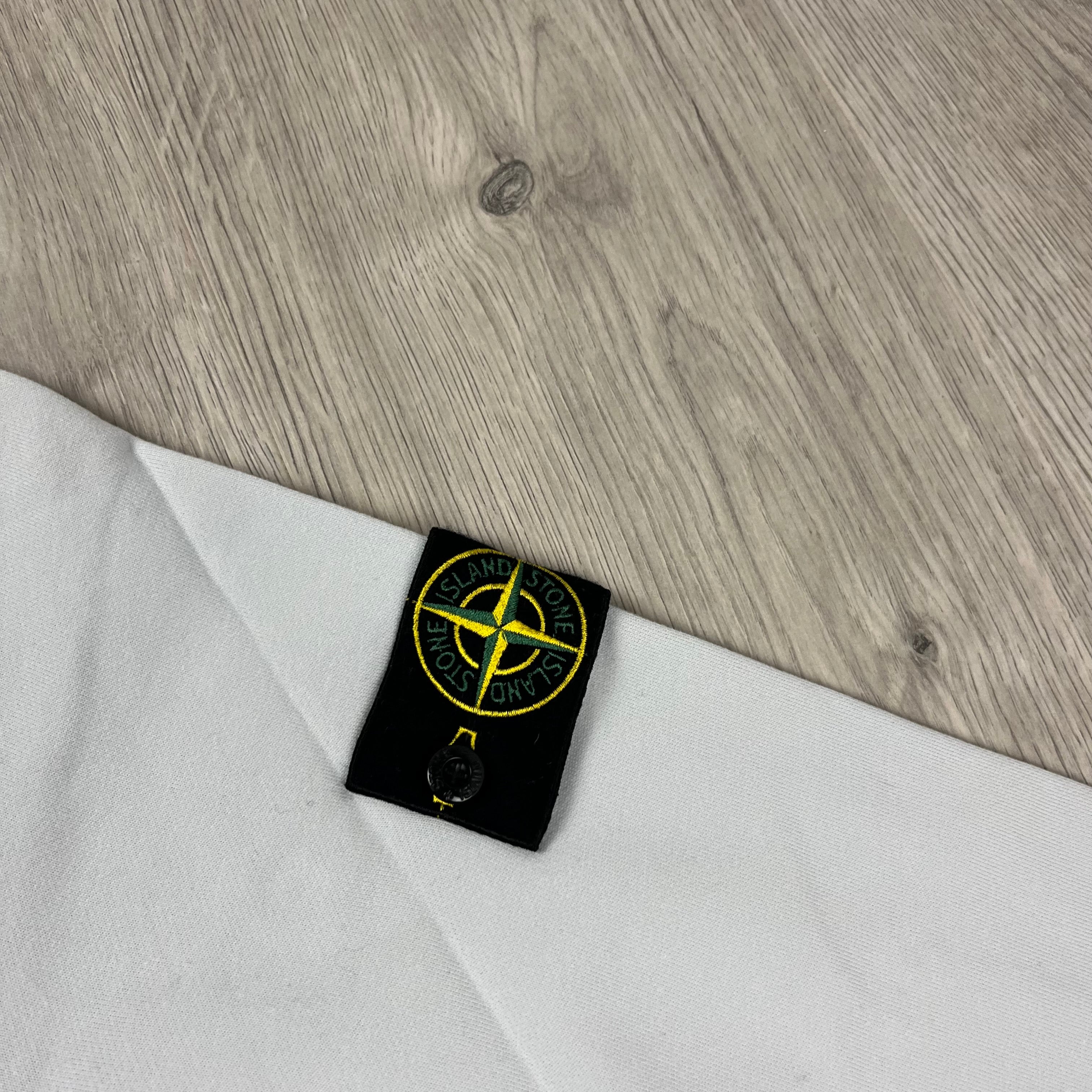 Stone Island Dyed Cotton Sweatshirt in Sky Blue. On sale at Open Attire.